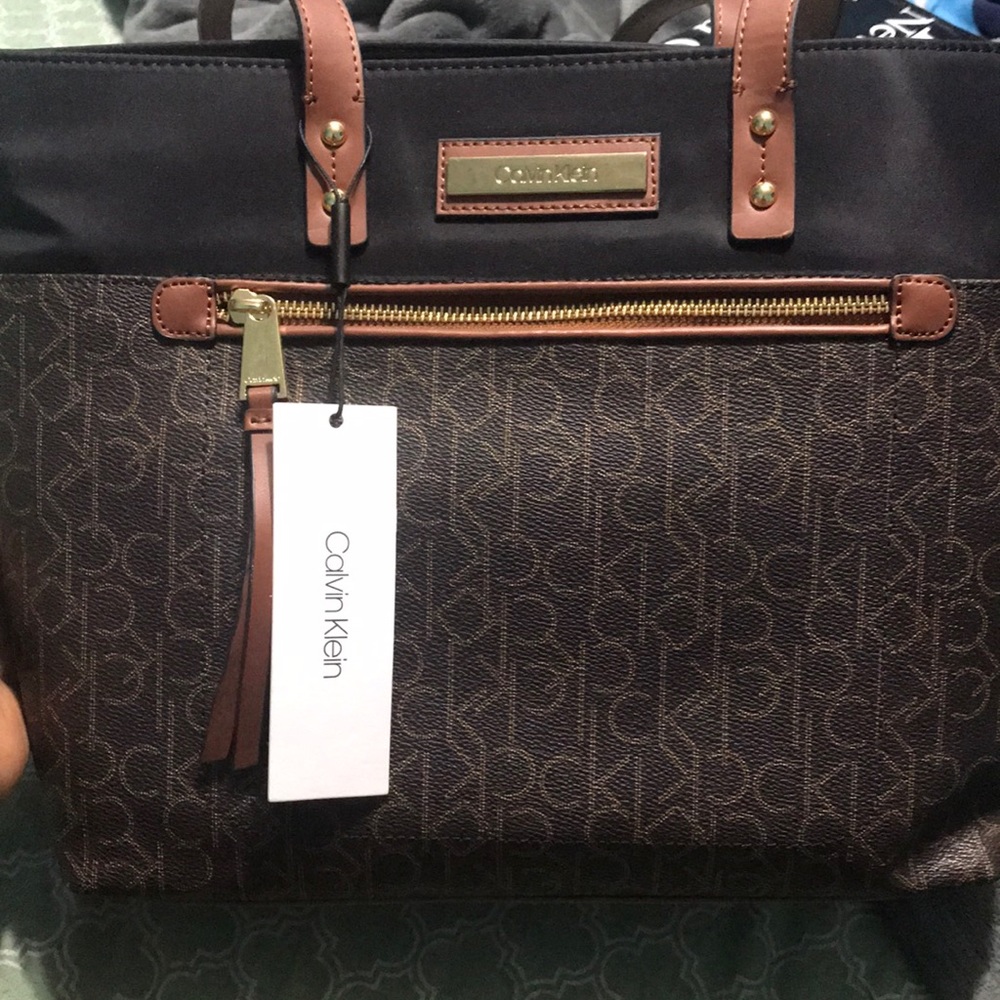 Calvin Klein black and brown purse.